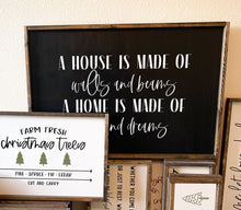 Load image into Gallery viewer, A house is made of walls and beams A home is made of love and dreams | framed wood sign