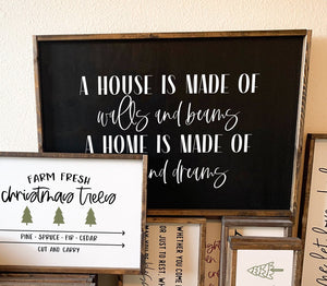 A house is made of walls and beams A home is made of love and dreams | framed wood sign