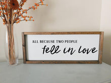 Load image into Gallery viewer, All because two people fell in love | framed wood sign | Anniversary gift | Gallery wall decor | Wall art