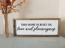 Load image into Gallery viewer, This home is built on love and shenanigans | framed wood sign | Living room wall art