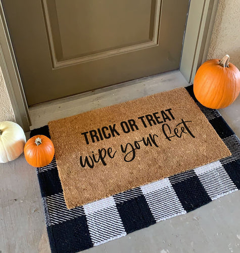 Trick or treat wipe your feet  Doormat