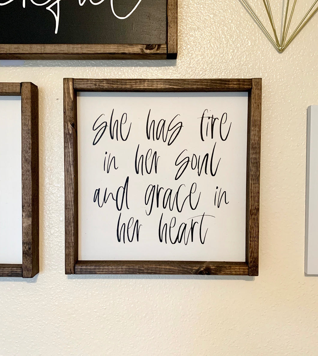 She has fire in her soul and grace in her heart | Framed wood sign